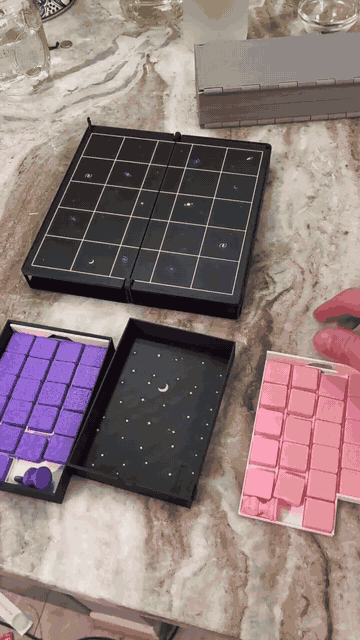 Physical folding Tak board and piece storage